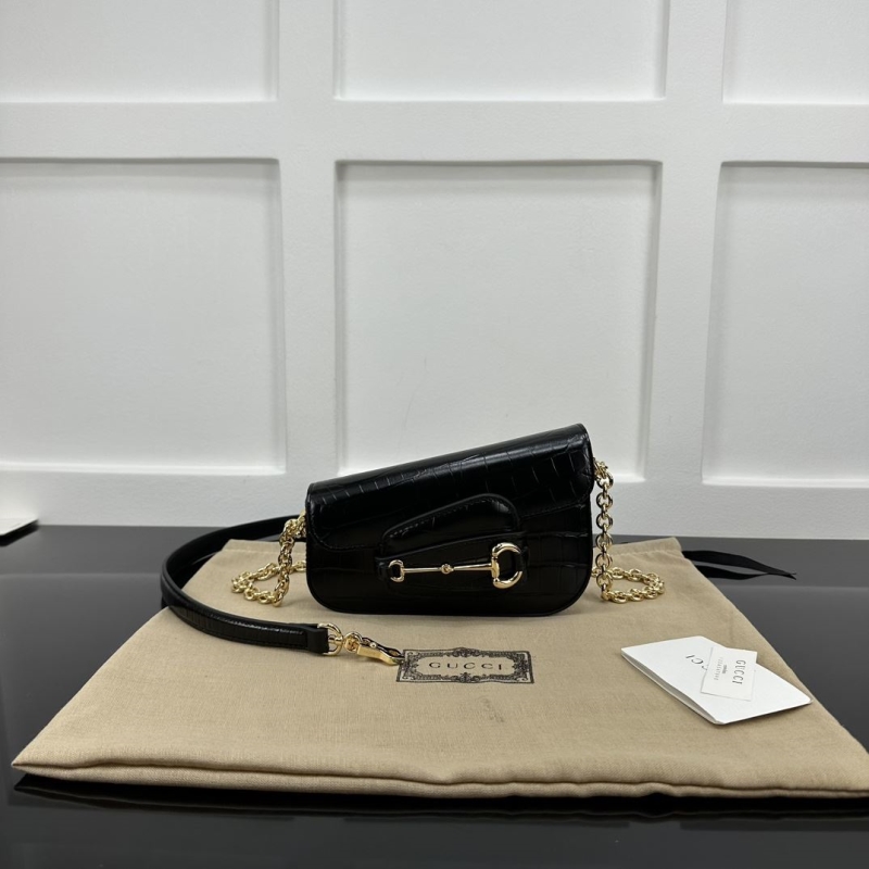 G*u*i top handle bags